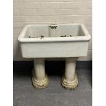 A Victorian porcelain sink on twin pedestal