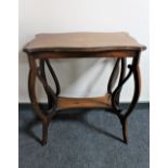 A Victorian inlaid mahogany occasional table