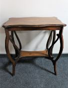 A Victorian inlaid mahogany occasional table