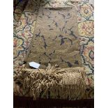 Three tapestry tasselled bed throws and one other