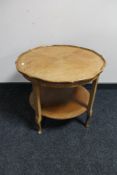 A mid 20th century two tier book table