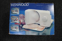 A boxed Kenwood meat slicer