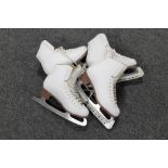 Two pairs of vintage ice skates