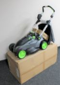 A G-Tech cordless electric lawn mower model number CLM001, with grass box, leads,