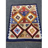 A woollen Kilim rug,