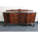 A serpentine fronted mahogany sideboard CONDITION REPORT: 153cm wide by 47cm deep.