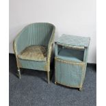 A painted loom basket chair and bedside cabinet