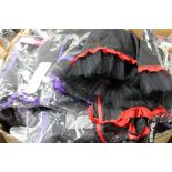 A box of Phaze pinafore dresses