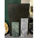 Three rectangular pieces of marble