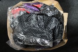 A box of satin bow mini skirts