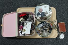 A tray of assorted costume jewellery, Royal Mint Sir Bobby Robson commemorative medal, stop watch,