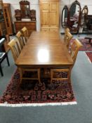 A good quality twin pedestal extending dining table, 231cm extended,