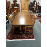 A good quality twin pedestal extending dining table, 231cm extended,