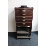 A late Victorian mahogany music cabinet