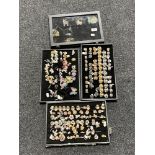 Four trays containing a large quantity of costume and fashion jewellery