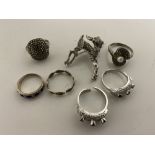 A quantity of silver jewellery - rings, brooch.