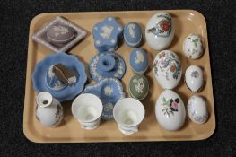 A tray of nine pieces of Wedgwood china - decorative eggs and vases,