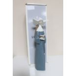 A Lladro figure - Prayerful Moments (blue), in original box.