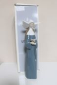 A Lladro figure - Prayerful Moments (blue), in original box.