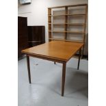 A mid 20th century Danish teak extending dining table