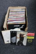 A box of small quantity of 45's singles including Adam and Ants, Jennifer Rush,