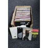 A box of small quantity of 45's singles including Adam and Ants, Jennifer Rush,