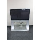 A Panasonic Viera 42 inch plasma TV on stand with lead and remote