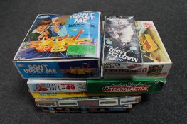 A box of vintage boards games - Wembley, The Great Game of Britain, Motorway board game,