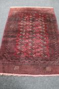 A fringed Afghan Tekke rug,