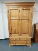 A good quality pine double door wardrobe,