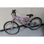 A girl's Trax TFS full suspension mountain bike