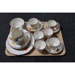 A tray of twenty-two piece hand painted china tea service