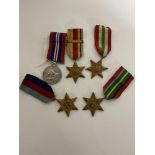 Collection of medals including Pacific Star, Africa Star with Africa 1942/43 bar,