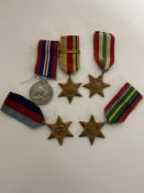 Collection of medals including Pacific Star, Africa Star with Africa 1942/43 bar,