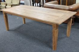 A pine farmhouse style kitchen table CONDITION REPORT: width 228cm height 77cm