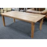 A pine farmhouse style kitchen table CONDITION REPORT: width 228cm height 77cm