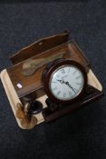 A tray of Edwardian mahogany letter rack, wooden storage drawer, contemporary mantel clock,