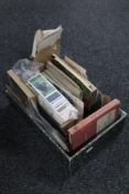 A box of cigar and tea cards, albums, 20th century postcards,