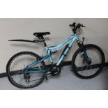 A girl's Apollo full suspension mountain bike