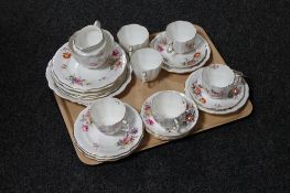 A tray of twenty-seven pieces of Royal Crown Derby bone china floral tea service