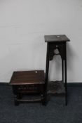 An antique oak storage stool and a inlaid Arts & Crafts plant stand