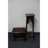 An antique oak storage stool and a inlaid Arts & Crafts plant stand