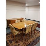 A mid 20th century walnut seven piece dining room suite : dining table 182 cm extended,