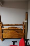 A 5' pine bed frame