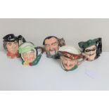 Five small Royal Doulton character jugs - The walrus and carpenter, Merlin,
