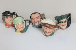 Five small Royal Doulton character jugs - The walrus and carpenter, Merlin,