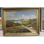 A 20th century gilt framed oil on canvas of a rural homestead, signed S.