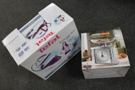 A Tefal hi pressure steam pressure iron together with a set of boxed kitchen scales