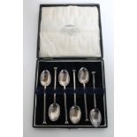 A set of six silver tea spoons in case,
