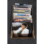 A box of seventy-five vinyl records - Michael Jackson, Ozzy Osbourne, Paul Young, Brian Ferry,
